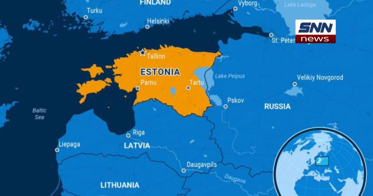 Estonian soldier standing with flag, symbolizing defense against possible Russian invasion