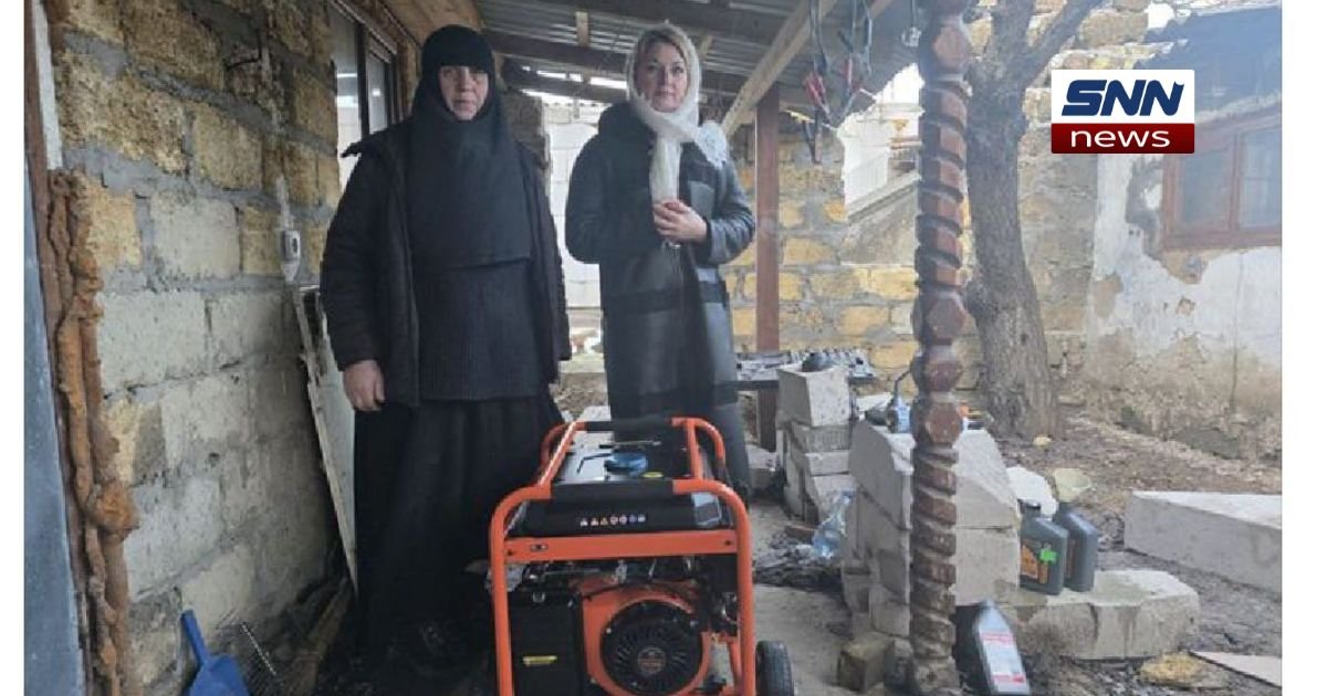 Nuns inside a dark, cold monastery in Skadovsk during prolonged blackout under Russian occupation.
