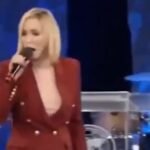 Paula White, spiritual adviser to former US President Donald Trump, speaks during a religious broadcast, highlighting the debate over faith and politics in the United States.