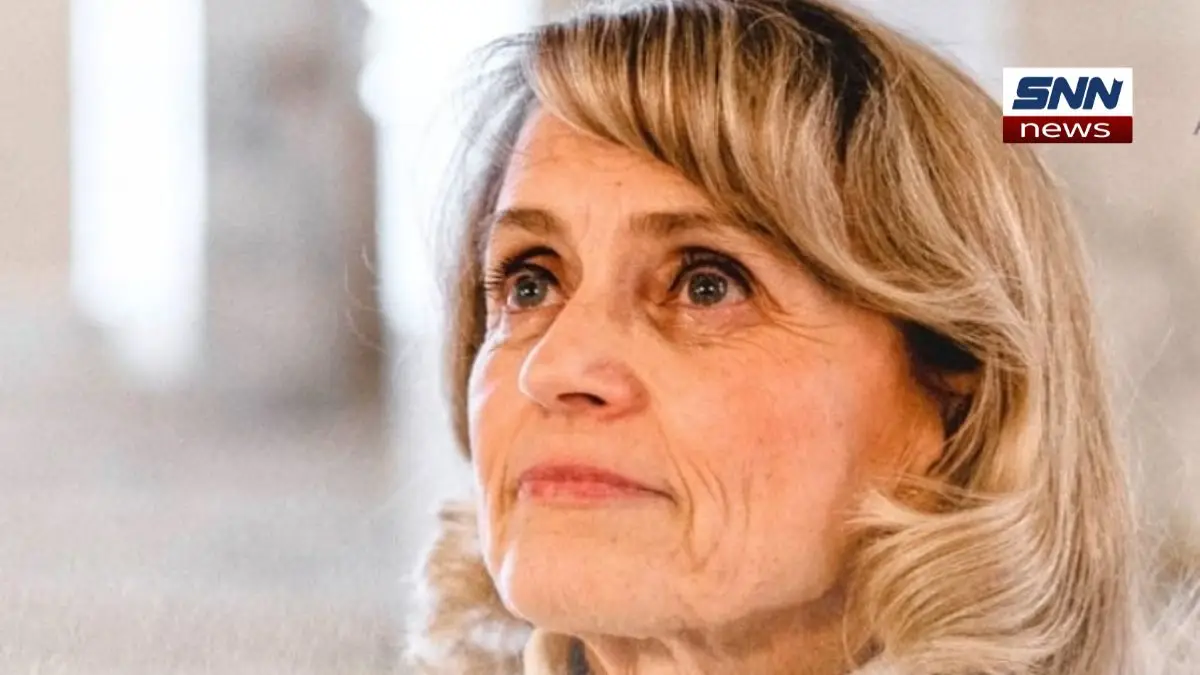 P&auml;ivi R&auml;s&auml;nen speaking at a public event in Finland, symbolizing free speech and religious expression.