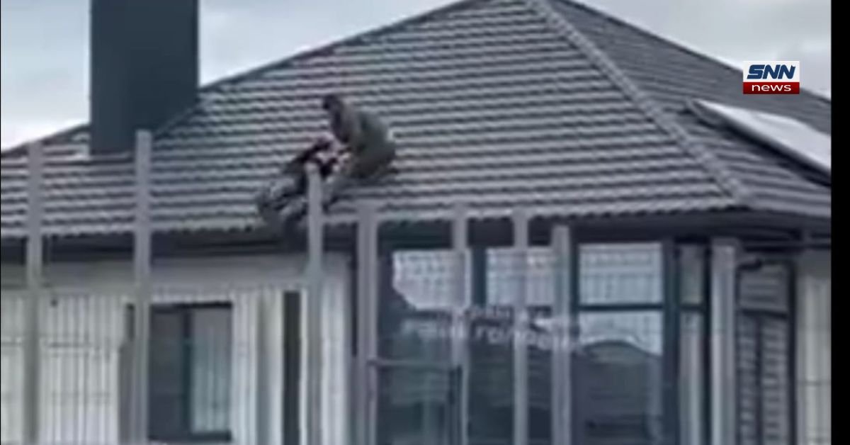 Ukraine officers on roof during rooftop chase arrest incident linked to draft enforcement and mobilization debate.