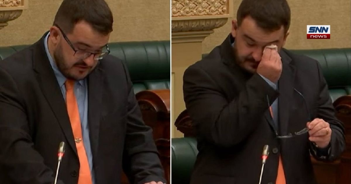 Australian politician Jason Virgo speaking at parliament podium after election win, highlighting controversy over immigration stance and personal relationship.