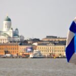 Finnish flags raised during Commemoration Day as Finland honors fallen soldiers with memorial events nationwide.
