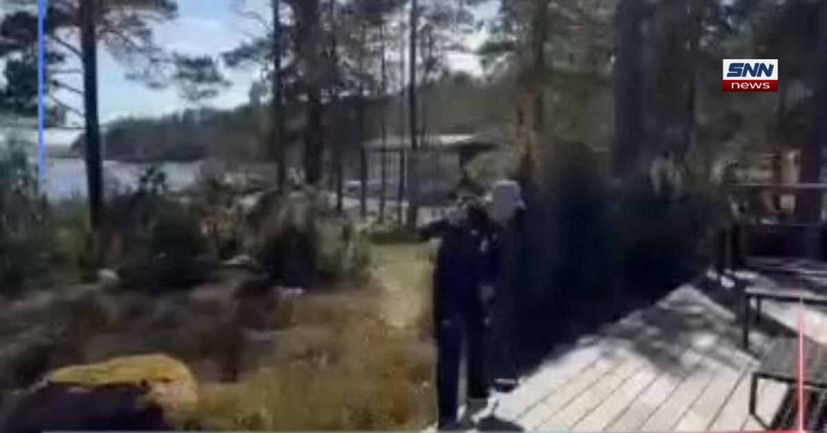 Alexander Stubb cleaning the outside area of his home in Finland during a casual public moment.