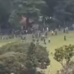 Indigenous Misak and Nasa communities in Colombia&rsquo;s Cauca region during a tense land dispute conflict with emergency response teams nearby.