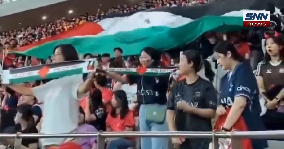 South Korea fans holding Palestinian flags inside a 2026 FIFA World Cup stadium fulfilling their qualifier solidarity promise
