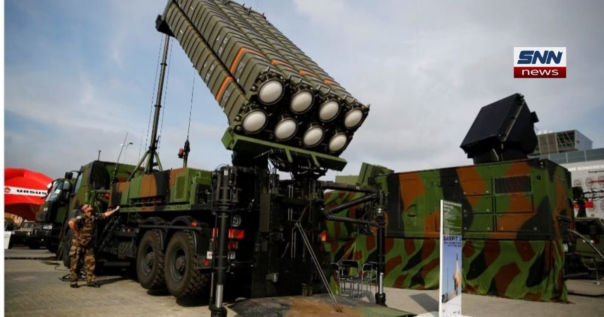 "Italy's &euro;3B Ukraine and Ukrainian flags with a missile defense system silhouette in the background, symbolizing reported military aid discussions"