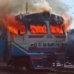 "Damaged railway carriage after a reported drone strike on a passenger train in Ukraine"