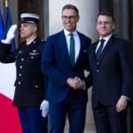 Finnish and France's flags displayed together, symbolizing defense cooperation"