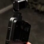 Honor Robot Phone featuring a 200MP camera on a robotic arm with advanced AI-powered smartphone technology.