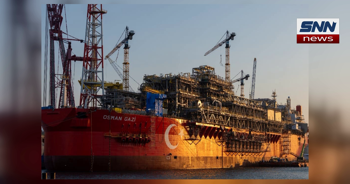 Turkiye's Osman Gazi floating production platform, a large red and white vessel at sea